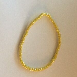 Bright yellow gold seed bead bracelet 5/10$